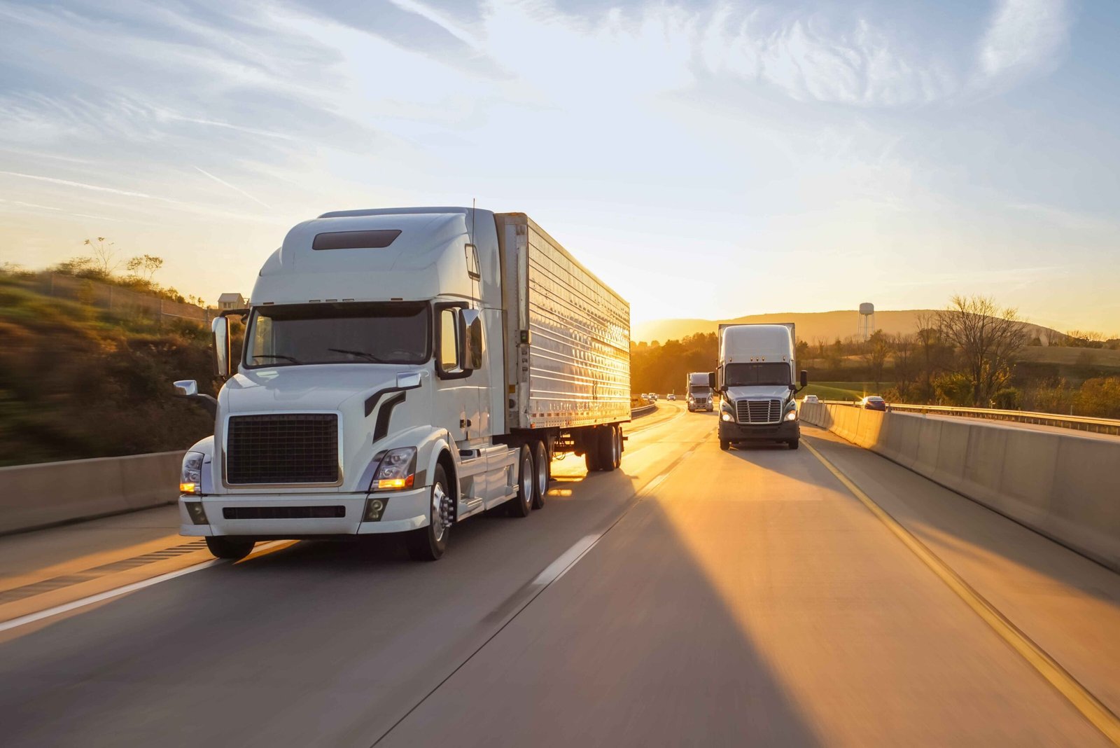 three-trucks-highway-sunrise (1)